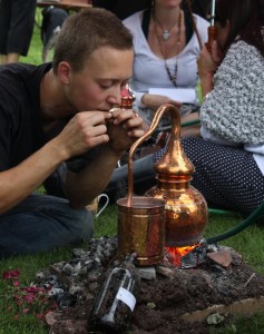 Distilling rose water on embers
